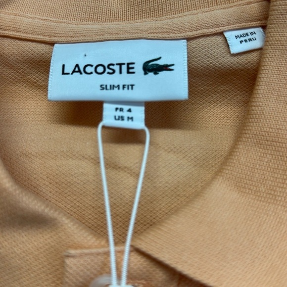 NWT Lacoste Men's Slim Fit L.12.12 Piqué Polo
Men Light Orange Lacoste Polos - Picture 6 of 7